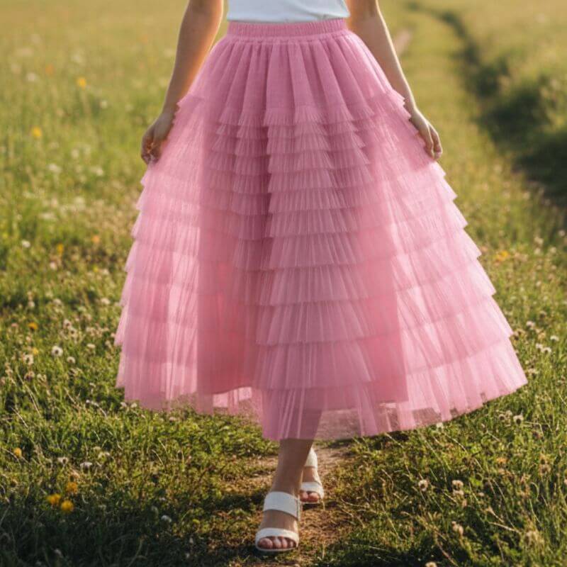 alt="Saia plissada feminina pink longa com babados Aurora Charm fashion e moderna"
