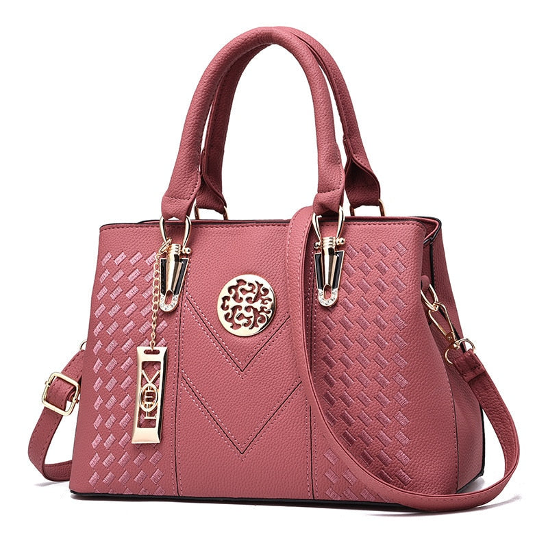 Bolsa Dália Lux pink em Couro Genuíno com detalhes orientais e estilo luxuoso feminino