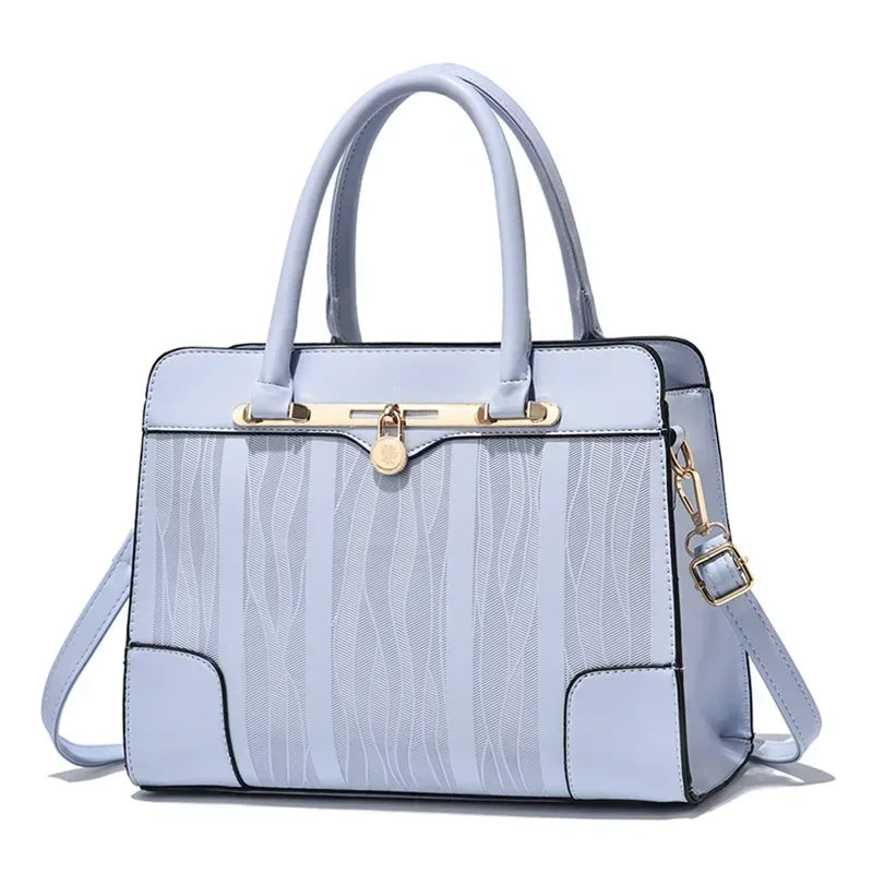 Bolsa azul estruturada com couro genuíno para looks executivos

