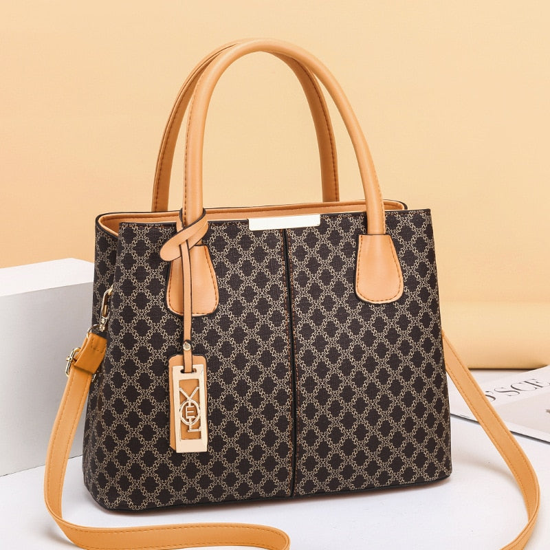 Bolsa laranja com alça de ombro e couro legítimo para looks sofisticados
