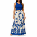 alt="Saia feminina longa estampada com folhagem azul tropical para look de verão sofisticado"